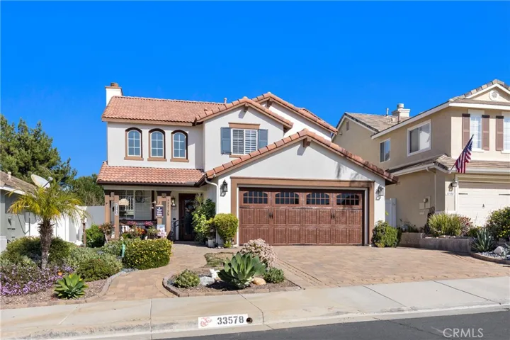 Stunning Two-Story Home With Great Curb Appeal In Desirable Neighborhood. Low Taxes and No Association