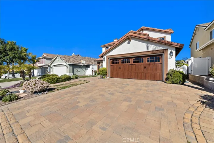 Spacious Driveway And Two-Car Garage With Attractive Curb Appeal