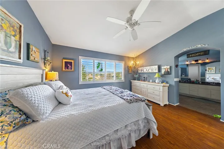 Spacious Primary Bedroom. Rich Flooring