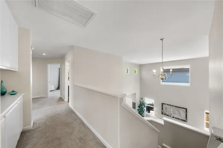 Upstairs with linen cabinet