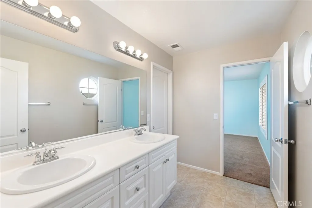 Upstairs Jack and Jill bathroom 3. With tub and shower.