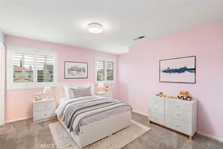 Virtual staging. Upstairs Bedroom 3. Connects to Jack and Jill bathroom 3.