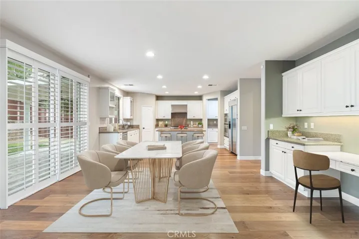 Virtual staging. Family dining in kitchen.