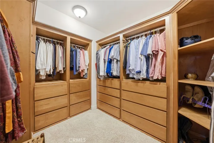 Large master closet with built- ins.