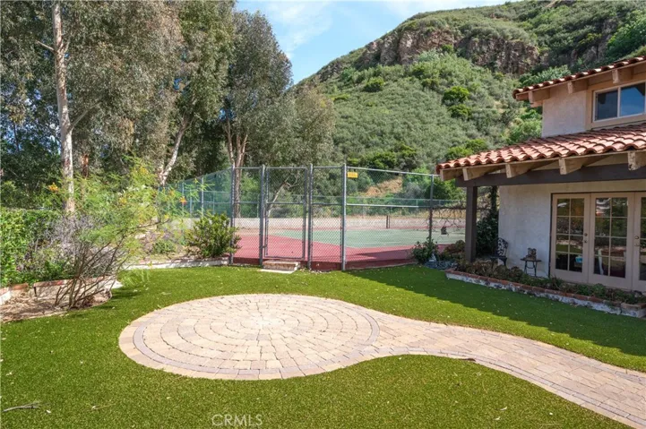 Front Yard Tennis Court Entrance
