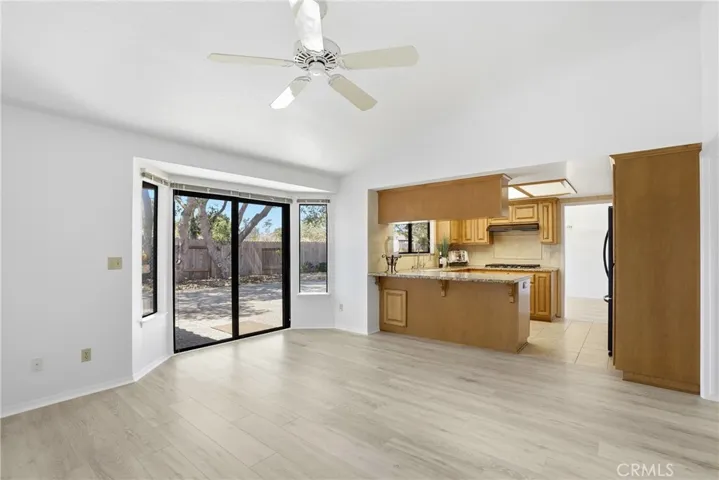 Family room opens to gourmet's kitchen & backyard patio