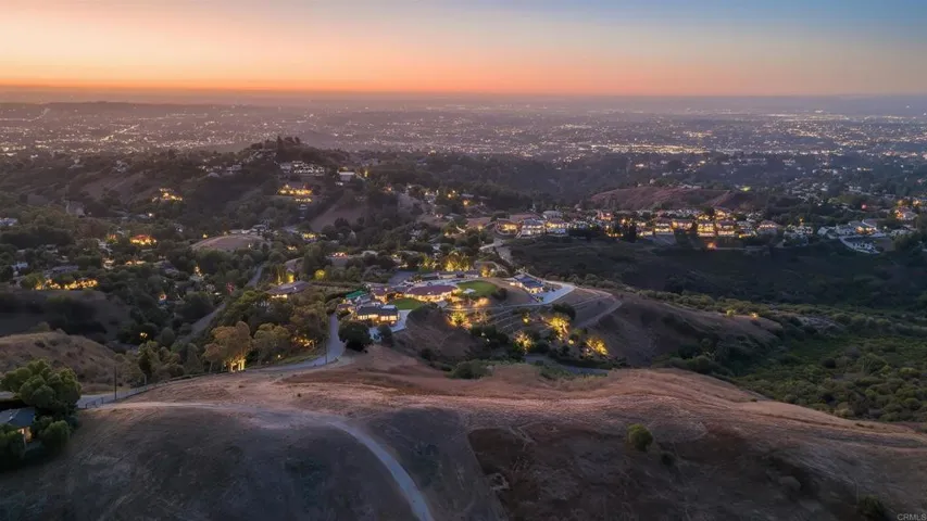 Dramatic aerial perspective showcasing the lot's prime location above the city.