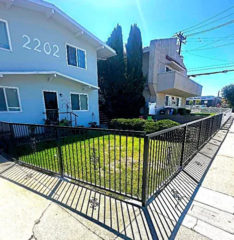 The Large Front Yard Area Recently had a Privacy Fence Surround Installed Offering Secure Use by the Tenants.