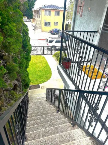 The Front Stairway Leads to the Upper Level Fron the Front Yard. With New Railings.