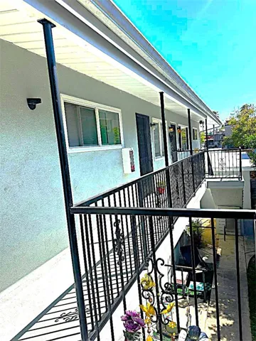 There are Three Units on the Upper Level Enclosed by the New Railings. This is the View Looking From the Front of the Building Towards the Rear.