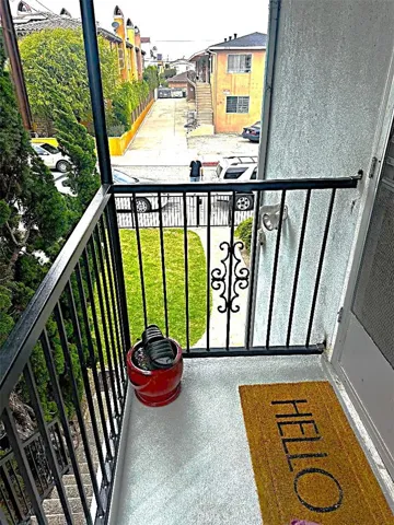 This is the View Looking Down to the Front Yard From the Front Upper Level Unit.