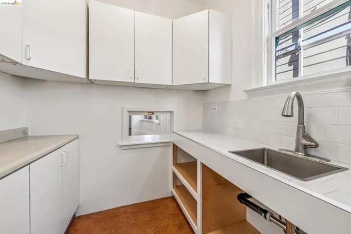 Laundry area with a sink