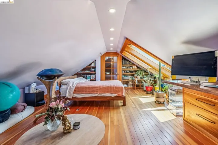 Bedroom with recessed lighting and light wood-style floors