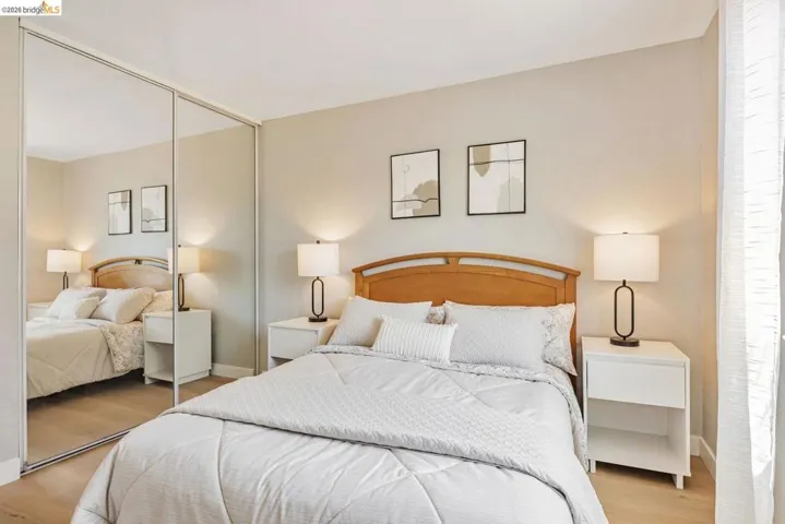 bedroom with a closet and light wood-type flooring