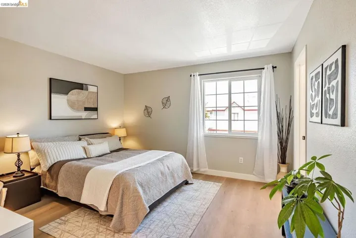 bedroom featuring light wood finished floors