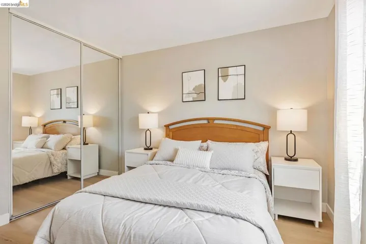 bedroom with a closet and light wood-type flooring