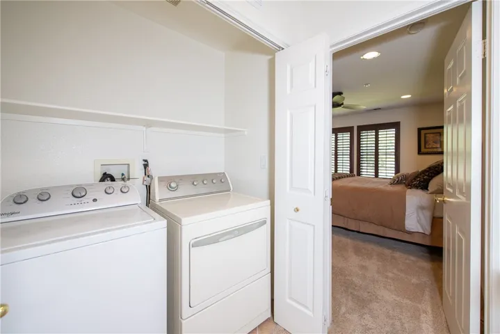 Laundry is easy to do right outside the primary bedroom.