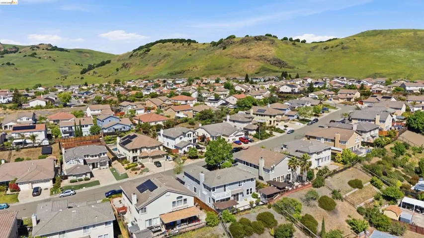 Aerial perspective of suburban area with mountains