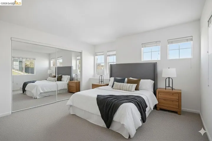 Bedroom with a closet and carpet flooring