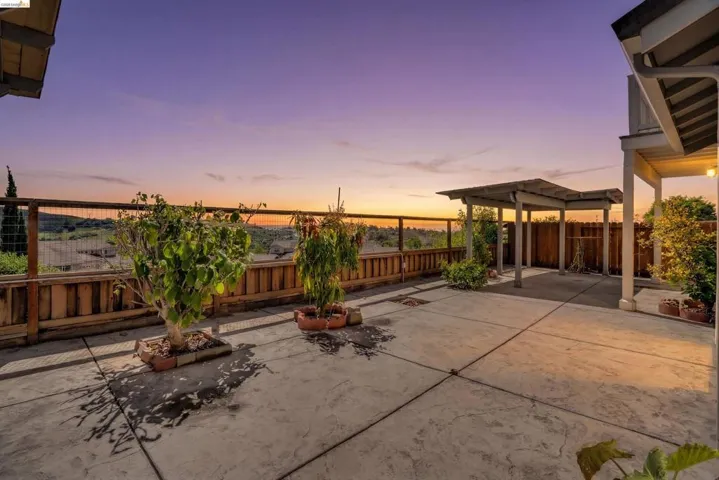 View of fenced backyard