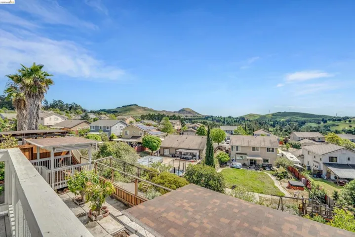 Aerial view of residential area featuring mountains