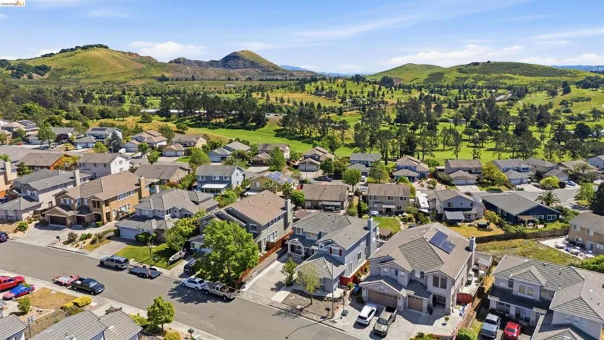 Aerial view of residential area with mountains