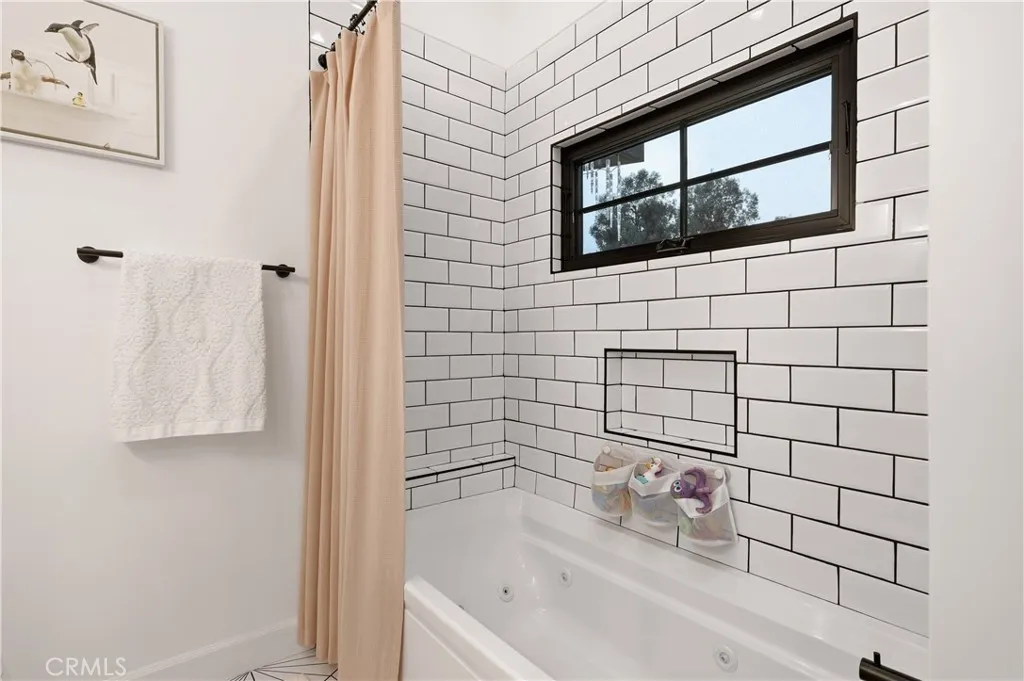 Bedroom 1 features a full bathroom with a 6-foot jetted soaking tub