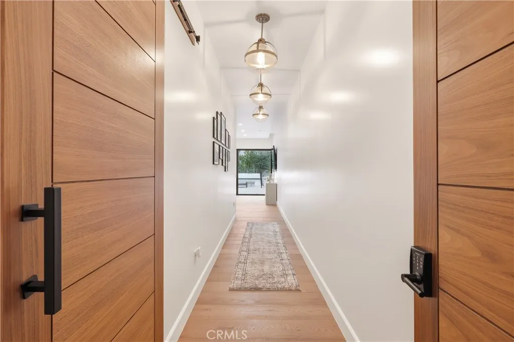 Master bedroom entryway and hallway w/ coded lock.
