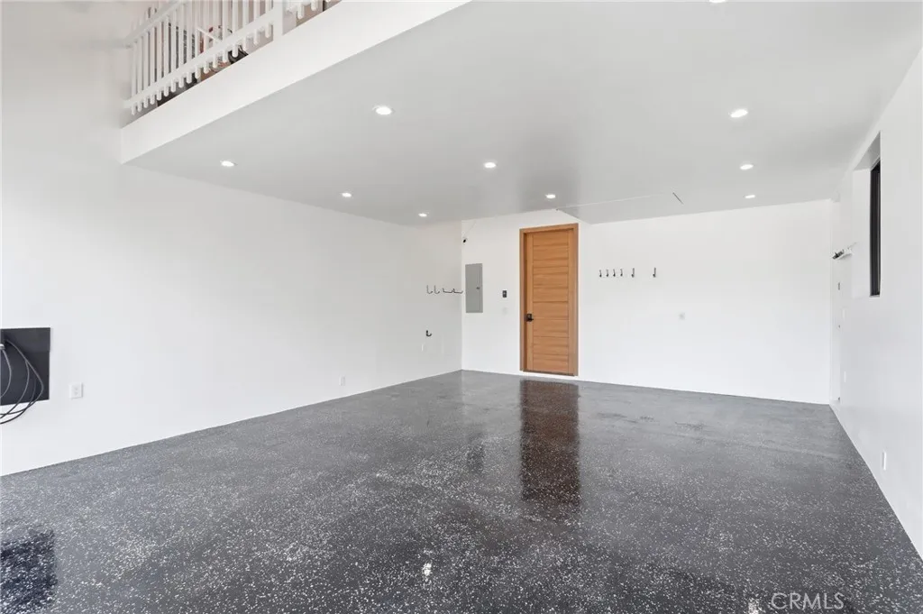 Immaculate garage with attic storage space