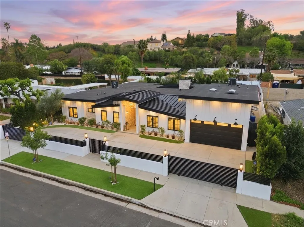 High-end, modern farmhouse curb appeal with a luxury edge!