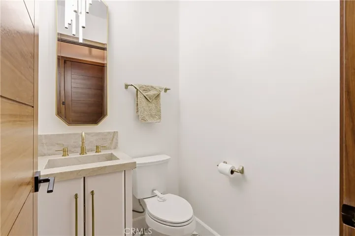 Powder Room with custom Taj Mahal quartzite sink!