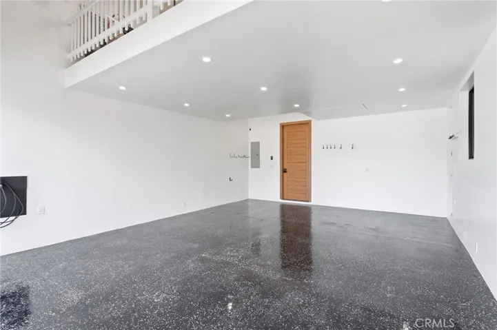 Immaculate garage with attic storage space