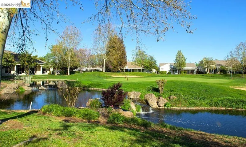 View of home's community featuring a water view and a residential view