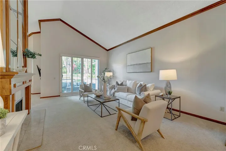 HIGH VAULTED CEILING WITH CROWN MOLDING AND BASEBOARDS