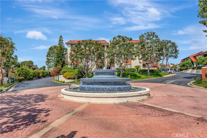 THIS LOVELY  TIERED FOUNTAIN GREETS ALL WHO ENTER!