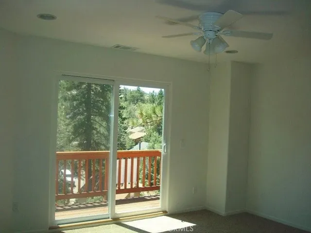 Primary suite w/ full bathroom and private deck.