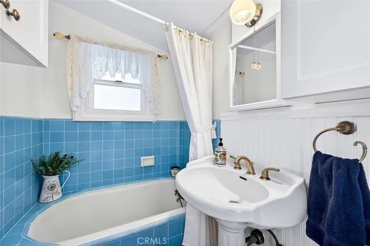 Charming bathroom on the main level.