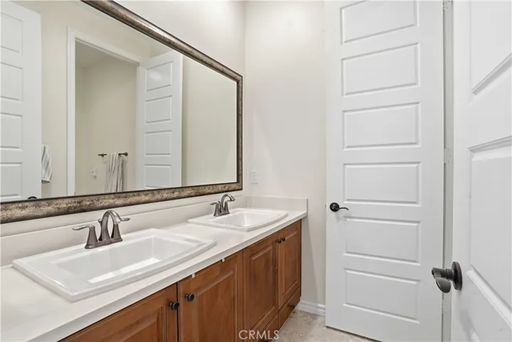 Bath with Dual Sinks