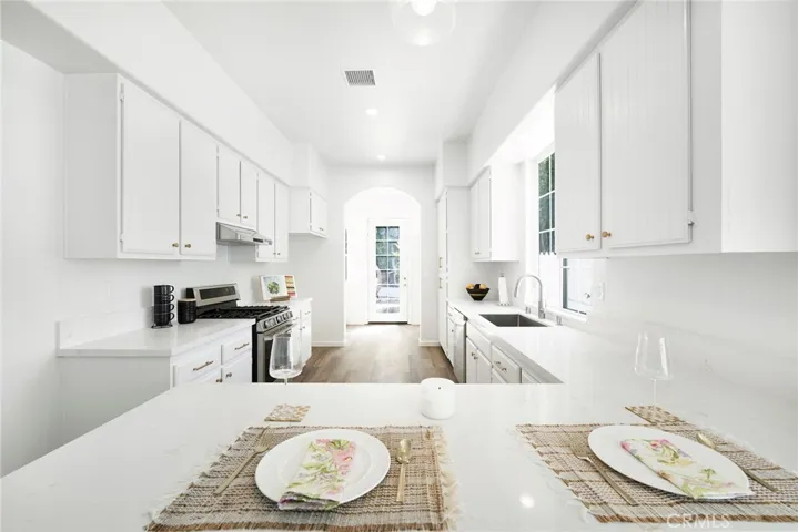 Make 66 a DONE DEAL with this rare one story remodeled and upgraded home.