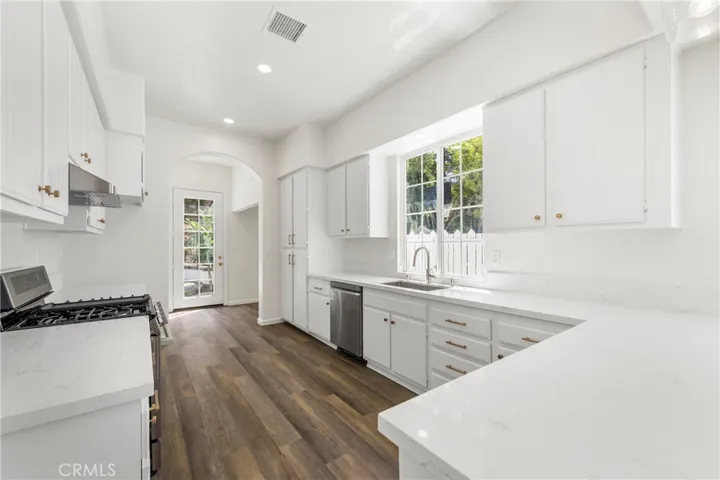 Make 66 a DONE DEAL with this rare one story remodeled and upgraded home.