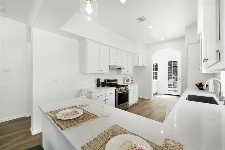 Make 66 a DONE DEAL with this rare one story remodeled and upgraded home.