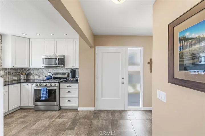updated kitchen with gas stainless stove