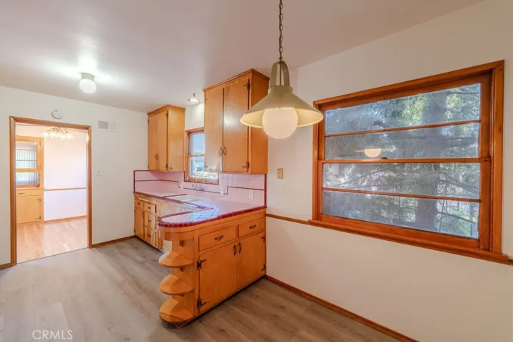 Large windows over dining area
