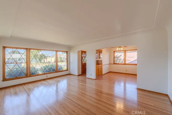 Large living room with refinished hardwood floors