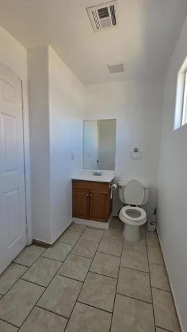 1/2Bathroom in Laundry Room