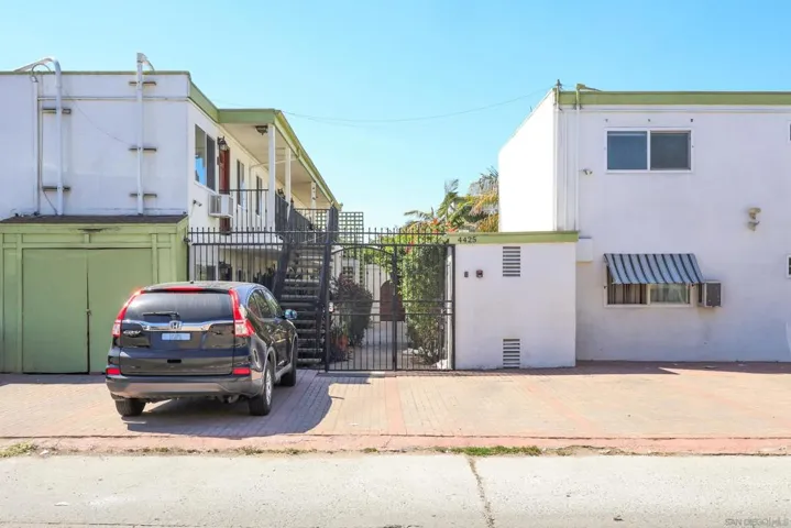 Back of Casa Del Sol building - alley space.