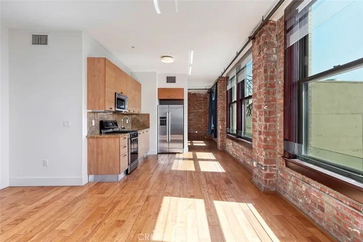 Living room to kitchen and bedroom