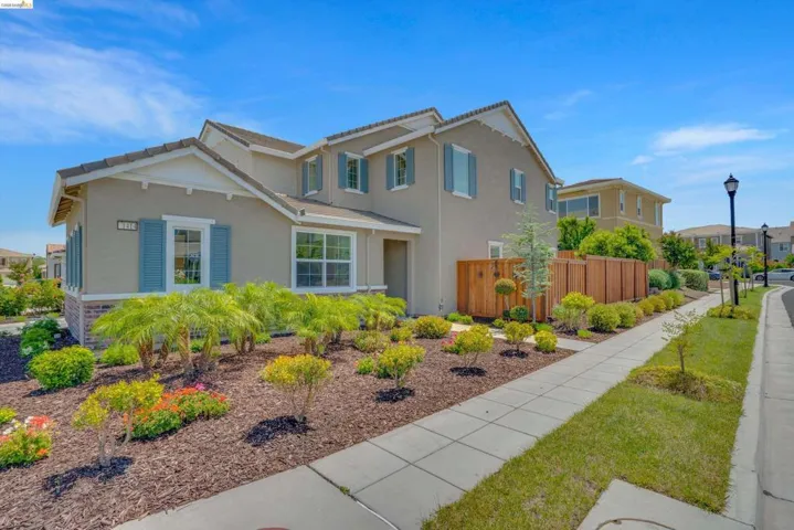 Traditional-style home featuring stucco siding