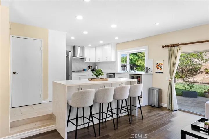 BAR-SITTING FAMILY ROOM AND KITCHEN