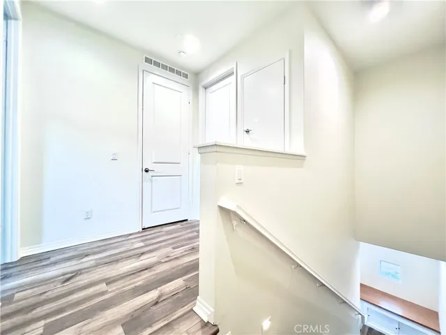 Landing area to both bedrooms & laundry machines